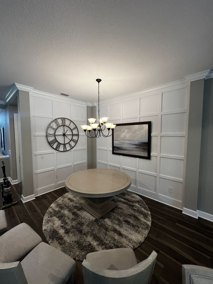 Custom built-ins and accent wall in a dining room