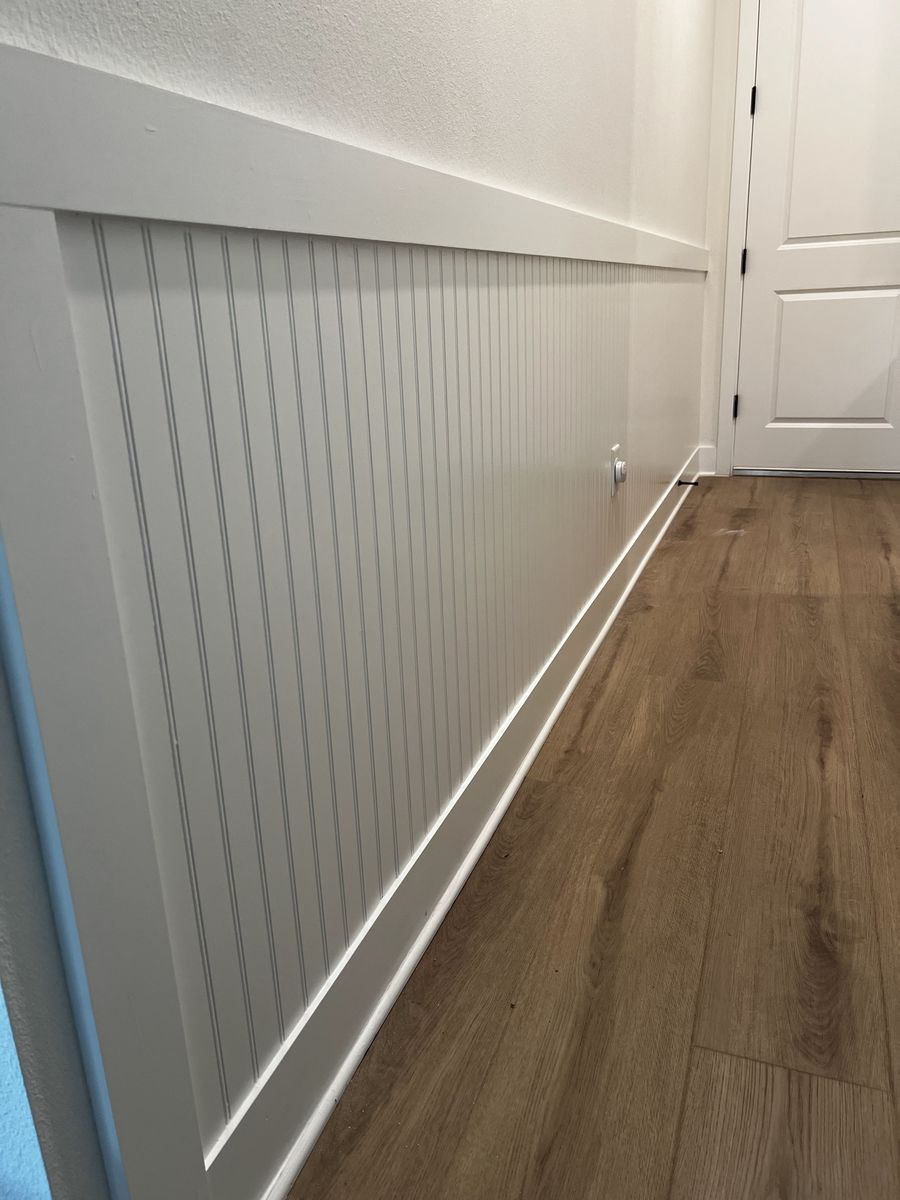 Custom hallway wall paneling and finish carpentry