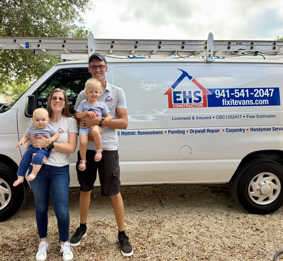 Robbie Evans and family in front of the EHS Construction service van